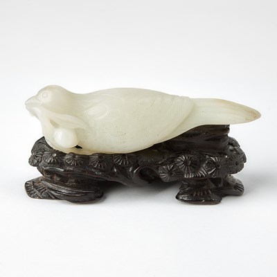 Lot 467 - A Chinese White Jade Figural Carving of a Quail