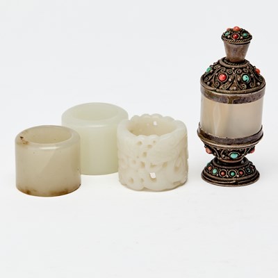 Lot 492 - A Group of Chinese Jade and Agate Thumb Rings