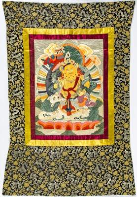 Lot 372 - A Tibetan Embroidered Silk Thangka of Jambhala