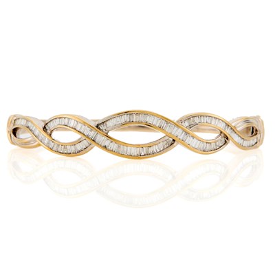 Lot 1083 - White Gold and Diamond Bangle Bracelet