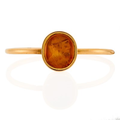 Lot 1048 - Gold and Carnelian Intaglio Bangle Bracelet