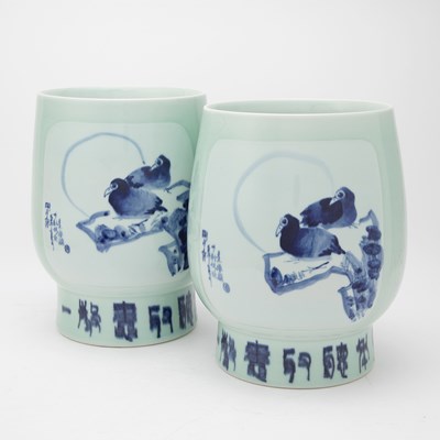 Lot 583 - An Unusual Pair of Chinese Celadon Glazed Porcelain Jars