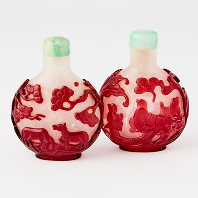 Lot 2 - A Pair of Chinese Overlay Glass Snuff Bottles