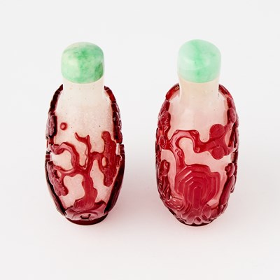 Lot 2 - A Pair of Chinese Overlay Glass Snuff Bottles
