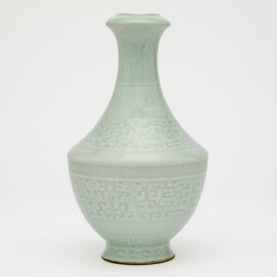 Lot 540 - A Chinese Carved Pale Celadon Glazed Porcelain Vase