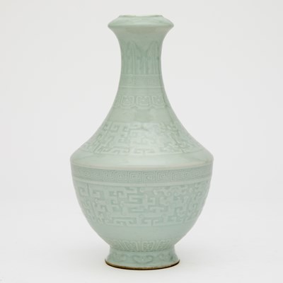 Lot 540 - A Chinese Carved Pale Celadon Glazed Porcelain Vase