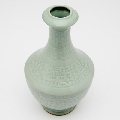 Lot 540 - A Chinese Carved Pale Celadon Glazed Porcelain Vase