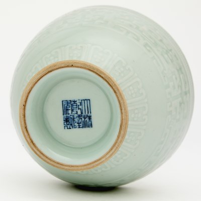 Lot 540 - A Chinese Carved Pale Celadon Glazed Porcelain Vase