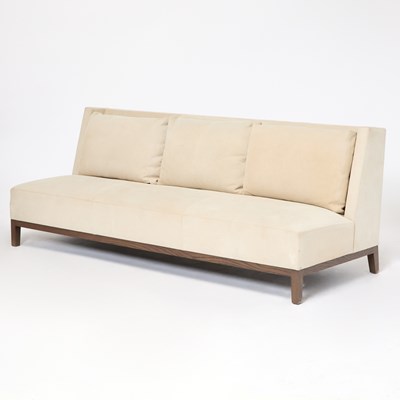Lot 256 - Christian Liaigre Upholstered Walnut Stained Sofa