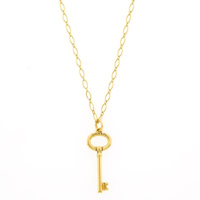 Lot 1195 - Tiffany & Co. Gold Key Pendant with Chain Necklace