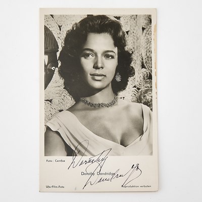 Lot 150 - A portrait postcard and lobby card signed by Dorothy Dandridge