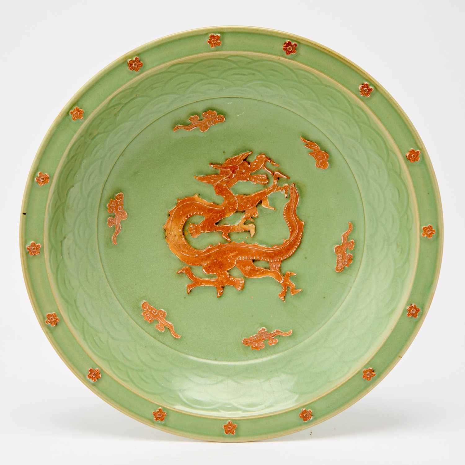 Lot 511 - A Chinese Longquan Celadon 'Dragon' Charger