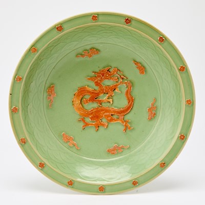 Lot 511 - A Chinese Longquan Celadon 'Dragon' Charger