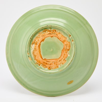 Lot 511 - A Chinese Longquan Celadon 'Dragon' Charger