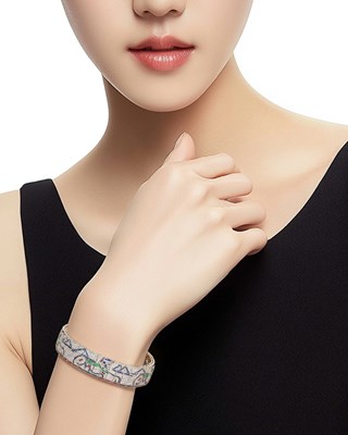 Lot 41 - Platinum Diamond and Gem-Set Bracelet