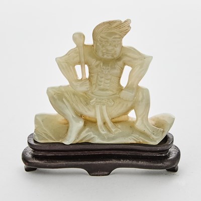 Lot 439 - A Chinese Celadon Jade Figural Carving of Vajrapani