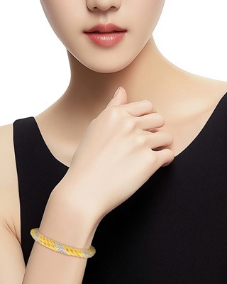 Lot 12 - Fluted Gold and Diamond Bangle Bracelet