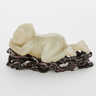 Lot 466 - A Chinese White Jade Figural Carving of a Boy