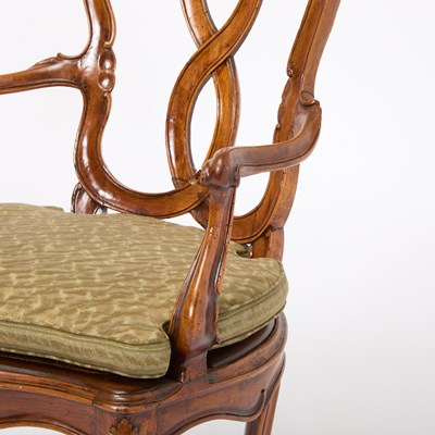 Lot 82 - Set of Four Italian Rococo Style Upholstered Walnut Open Armchairs