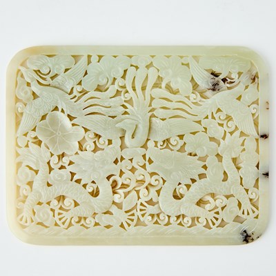Lot 427 - A Chinese 'Dragon and Phoenix' Jade Reticulated Plaque