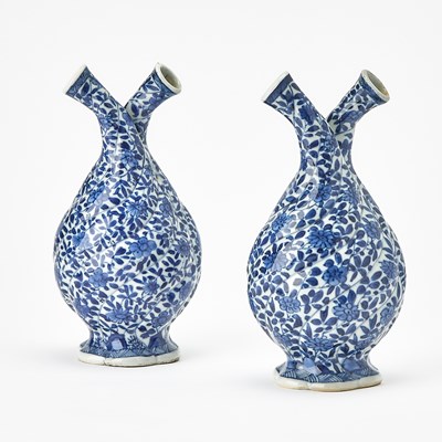 Lot 130 - A Pair of Chinese Blue and White Porcelain Double-Neck Cruets