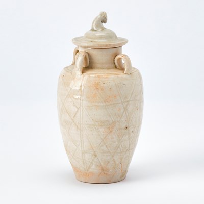 Lot 83 - A Chinese White Glazed Miniature Storage Jar and Cover