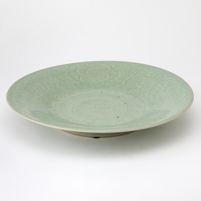 Lot 177 - A Chinese Celadon Glazed Carved Porcelain Charger