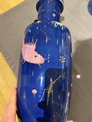 Lot 76 - A Chinese Blue Ground Enameled Porcelain 'Fishes' Rouleau Vase