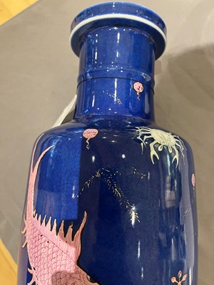 Lot 76 - A Chinese Blue Ground Enameled Porcelain 'Fishes' Rouleau Vase