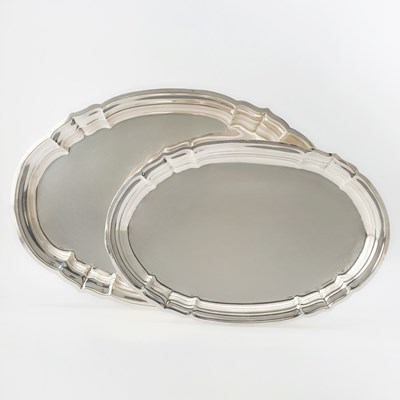 Lot 559 - Graduated Pair of Reed & Barton Sterling Silver "Newport" Pattern Platters