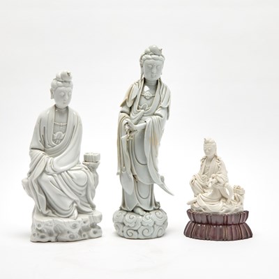 Lot 561 - Three Chinese Dehua Porcelain Figures of Guanyin