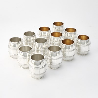 Lot 329 - Set of Twelve Tiffany & Co Sterling Silver Novelty Barrel-Form Beakers