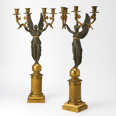 Lot 544 - Pair of Empire Style Patinated and Gilt-Bronze Figural Four-Light Candelabra