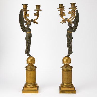 Lot 544 - Pair of Empire Style Patinated and Gilt-Bronze Figural Four-Light Candelabra