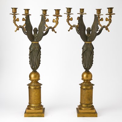 Lot 544 - Pair of Empire Style Patinated and Gilt-Bronze Figural Four-Light Candelabra