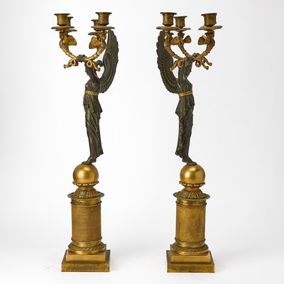 Lot 544 - Pair of Empire Style Patinated and Gilt-Bronze Figural Four-Light Candelabra