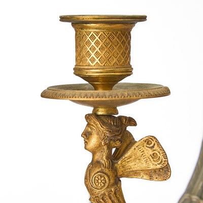 Lot 544 - Pair of Empire Style Patinated and Gilt-Bronze Figural Four-Light Candelabra