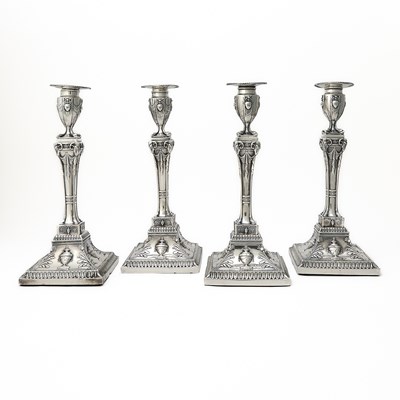 Lot 27 - Set of Four George III Sterling Silver Candlesticks