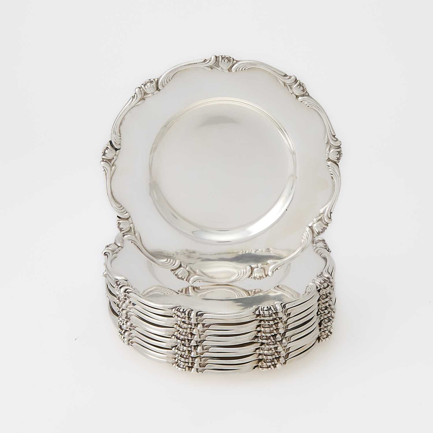 Lot 565 - Set of Twelve Peruvian Silver Bread Plates