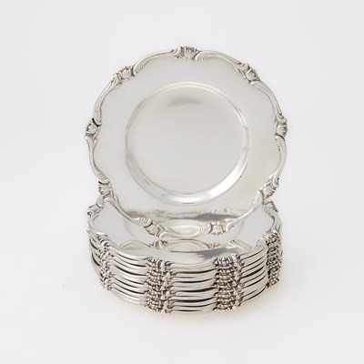Lot 565 - Set of Twelve Peruvian Silver Bread Plates
