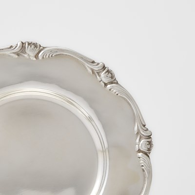Lot 565 - Set of Twelve Peruvian Silver Bread Plates