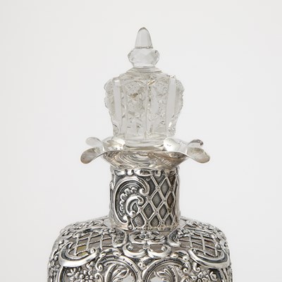 Lot 541 - Eight Silver and Glass Decanters