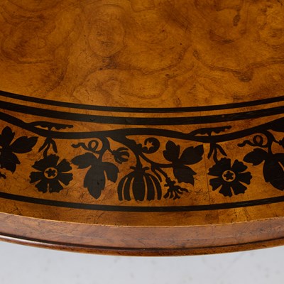 Lot 615 - Baker Regency Style Ebony Inlaid Burl Ash Center Table
