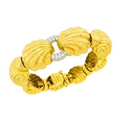 Lot 159 - David Webb Hammered Gold, Platinum, and Diamond 'Escargot' Bracelet