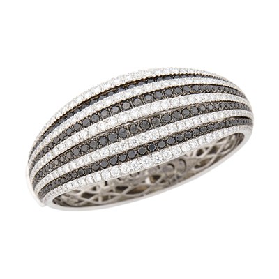 Lot 53 - White and Blackened Gold, Diamond and Black Diamond Cuff Bangle Bracelet