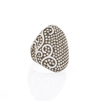 Lot 1057 - Two-Color Gold, Colored Diamond and Diamond Ring