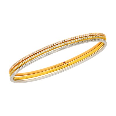 Lot 127 - Roberto Coin Three Two-Color Gold and Diamond Bangle Bracelets