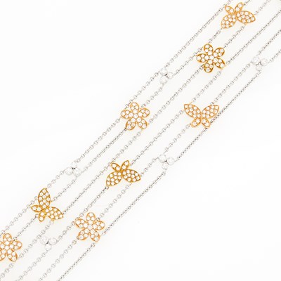 Lot 1059 - Two-Color Gold and Diamond Five Strand Bracelet