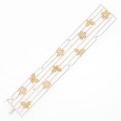Lot 1059 - Two-Color Gold and Diamond Five Strand Bracelet