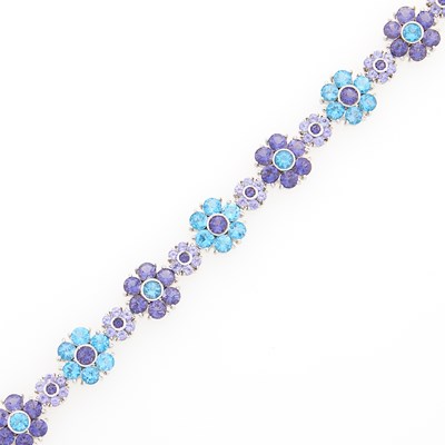 Lot 1052 - White Gold, Blue Topaz and Iolite Bracelet